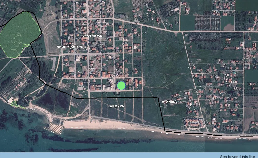 The official forest-map viewer over a coastal plot at Nea Propontida in Halkidiki showing no hatching over the plot and one ratified polygon to the north-west